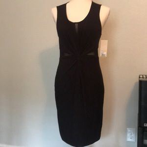 Black dress with panels along waist and neckline